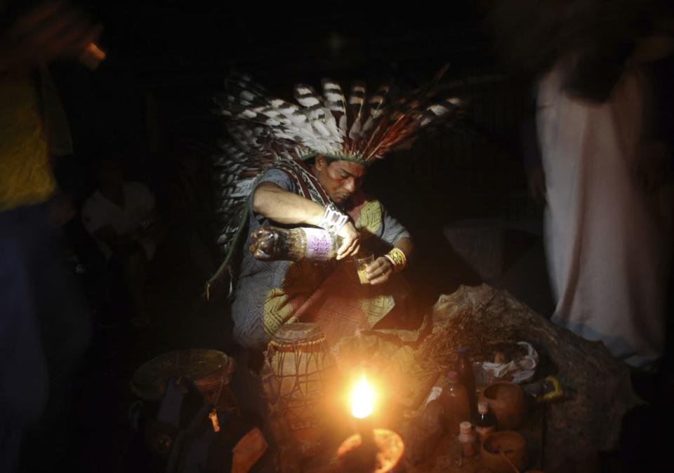 Ayahuasca is preupared to use in a healing ritual in the village of Novo Segredo along the Envira river of Brazil's northwestern Acre state.