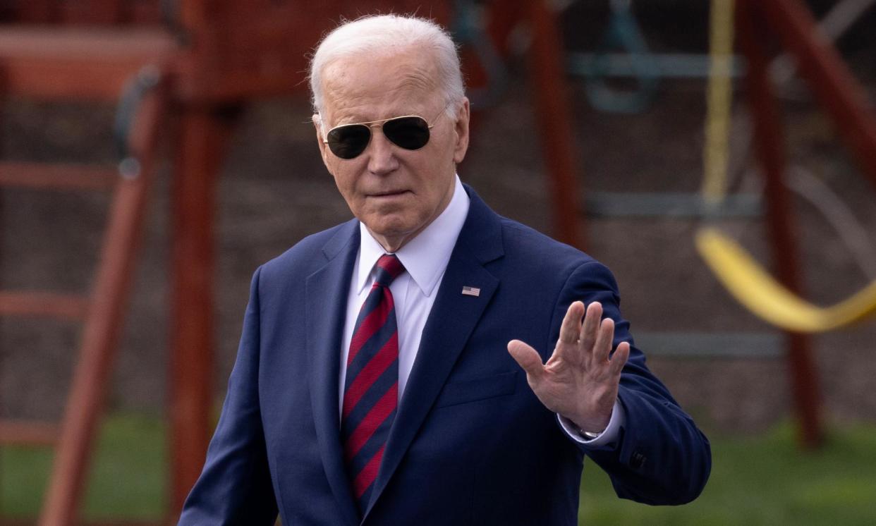 <span>Joe Biden waves as he departs the White House to hit the campaign trail on Wednesday.</span><span>Photograph: Michael Reynolds/EPA</span>