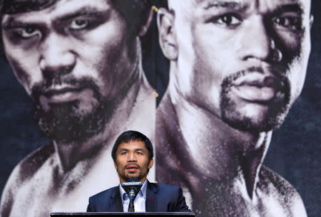 WBO welterweight champion Manny Pacquiao of the Philippines speaks during a final news conference at the MGM Grand Arena in Las Vegas, Nevada April 29, 2015. REUTERS/Las Vegas Sun/Steve Marcus