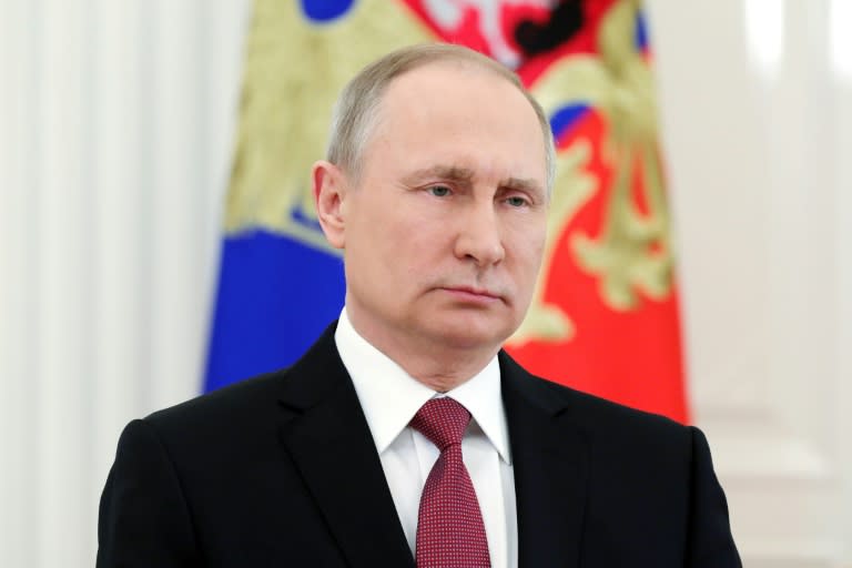 Russian President Vladimir Putin delivers a televised address to the nation in Moscow on March 23, 2018, following the announcement of the presidential election official results