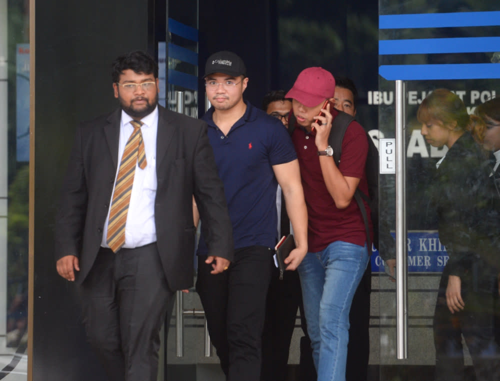 Haziq Abdullah Abdul Aziz pictured leaving the Dang Wangi police station June 15, 2019.