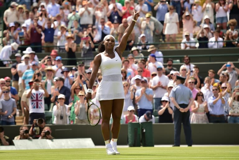 US player Serena Williams celebrates beating Russia's Margarita Gasparyan on day one of the 2015 Wimbledon Championships at The All England Tennis Club in London, on June 29, 2015