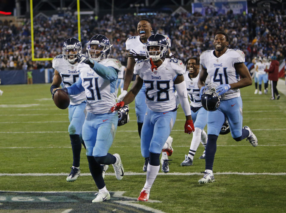 Tennessee Titans free safety Kevin Byard (31) celebrates after intercepting a pass against the Washington Redskins late in the fourth quarter of an NFL football game Saturday, Dec. 22, 2018, in Nashville, Tenn. (AP Photo/James Kenney)