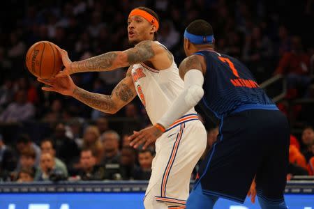 Dec 16, 2017; New York, NY, USA; New York Knicks small forward Michael Beasley (8) passes the ball defended by Oklahoma City Thunder power forward Carmelo Anthony (7) during the third quarter at Madison Square Garden. Mandatory Credit: Brad Penner-USA TODAY Sports