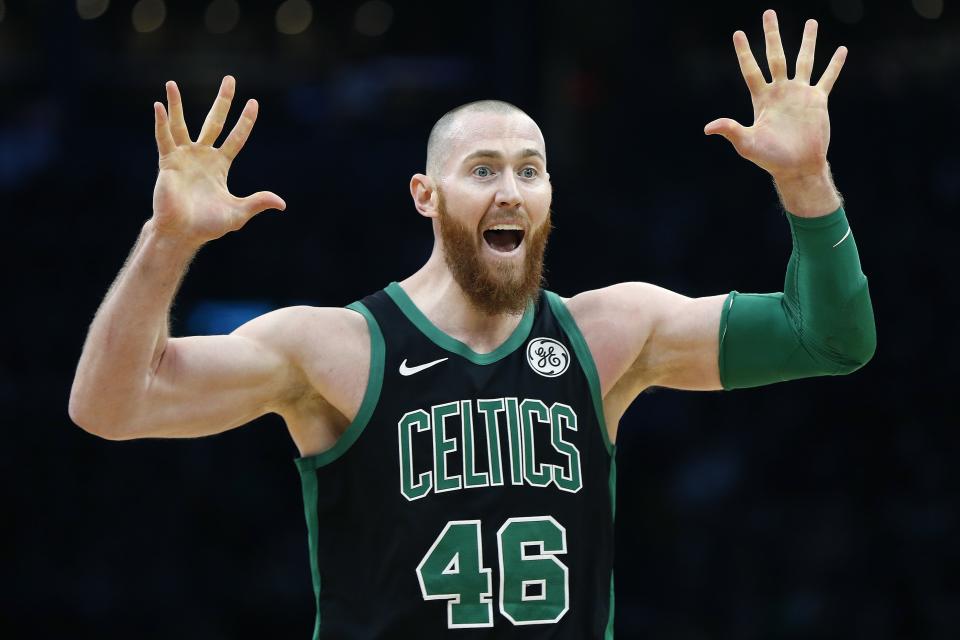 Boston Celtics' Aron Baynes reacts to a call during the first half of an NBA basketball game Houston Rockets in Boston, Sunday, March 3, 2019. (AP Photo/Michael Dwyer)