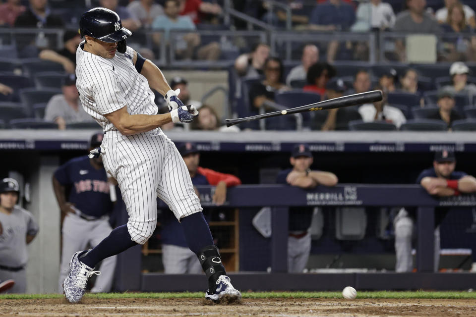New York Yankees' Giancarlo Stanton loses the grip on his bat as he grounds out during the fifth inning of the team's baseball game against the Boston Red Sox on Sunday, July 18, 2021, in New York. (AP Photo/Adam Hunger)