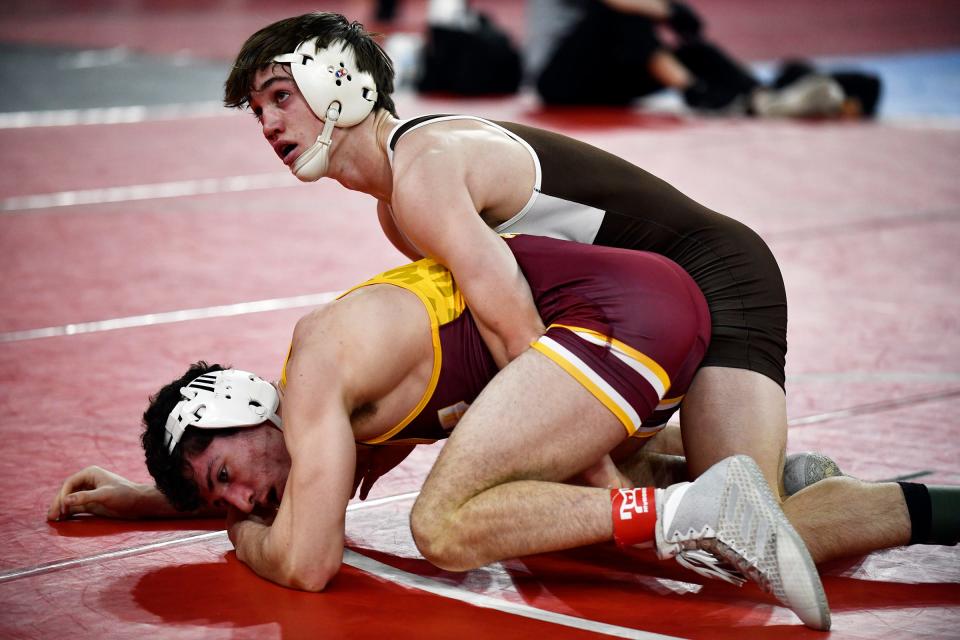 Delran's Drew Roskos, top, defeated Jack Oseback of Wayne Hills 2-0 following Thursday's 144-pound wrestling bout at Boardwalk Hall in Atlantic City, N.J. March 3, 2022.