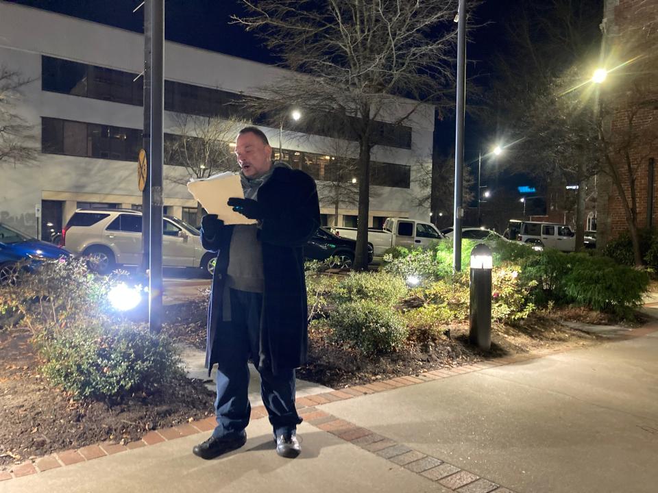 Joseph Wheeler speaks Monday, Jan. 8, 2024, outside of Fayetteville City Hall about concerns with recently sending Fayetteville homeless residents to Durham and lack of living spaces for the homeless.