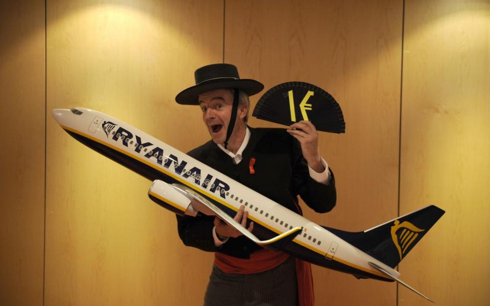 Ryanair warned it could cut jobs in markets such as Spain, where it faces threats of strike action - AFP