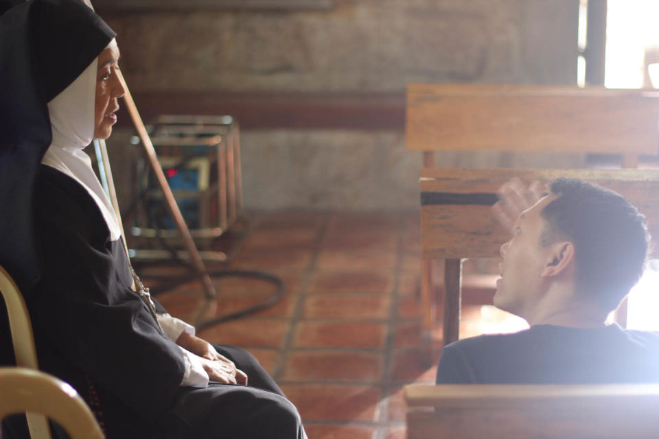 Director Vincent Sandoval talking to Fides Asensio who plays Mother Superior in the movie (Photo courtesy of Cinemalaya)