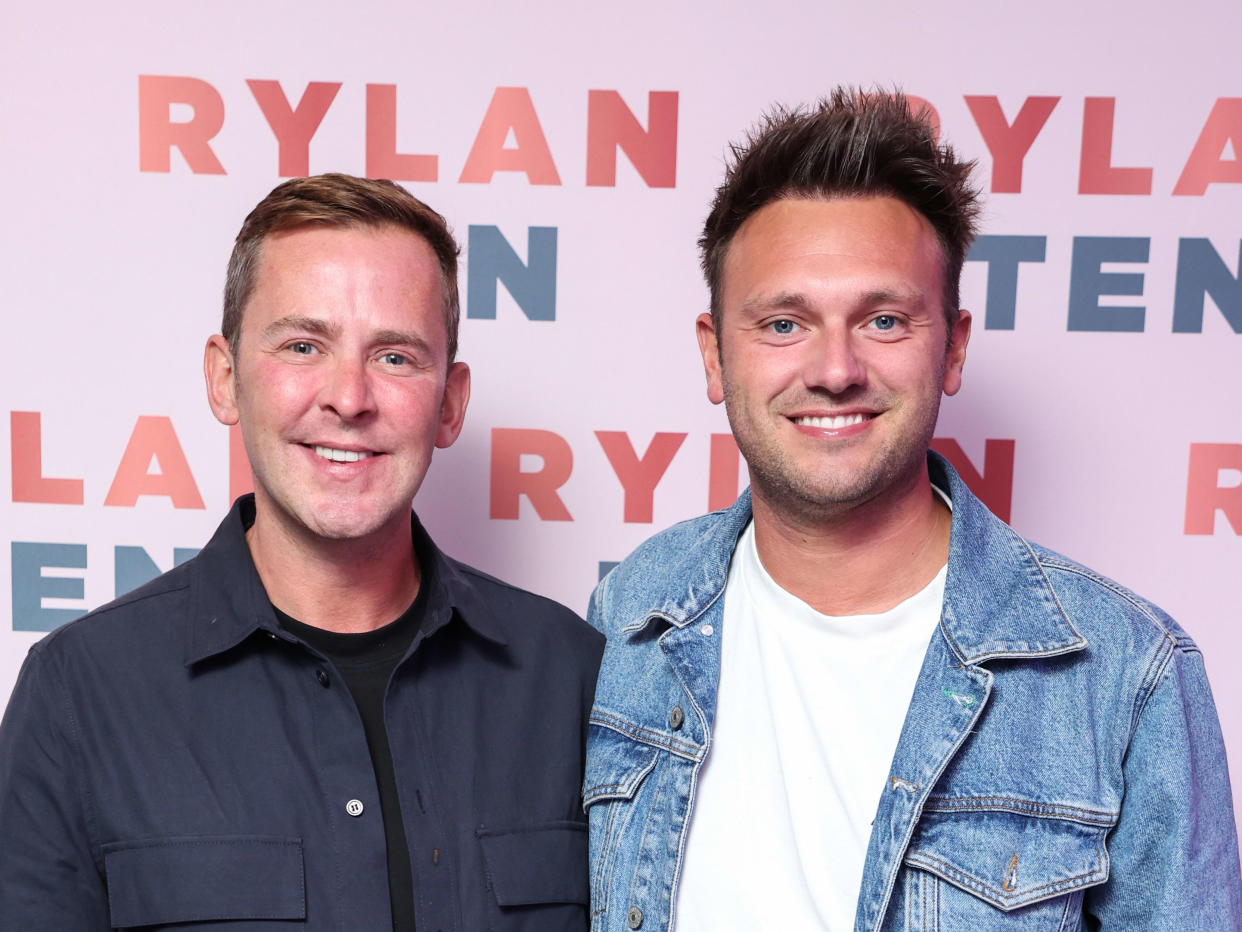 LONDON, ENGLAND - SEPTEMBER 23:  Scott Mills and Sam Vaughan attend the launch of Rylan Clark's new book 