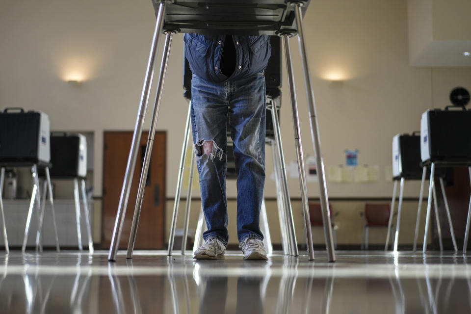 A voter fills out their Ohio primary election ballot at a polling location in Knox Presbyterian Church in Cincinnati, Ohio, on Tuesday, March 19, 2024. (AP Photo/Carolyn Kaster)