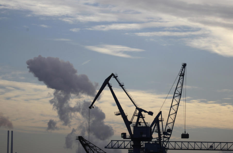 FILE - In this Jan. 25, 2012 file photo cranes are silhouetted against the sky while clouds of the steel producing company's in background show up in Orsoy, Germany. Germany's economy, Europe's largest, grew a larger-than-expected 0.3 percent in the second quarter as consumer spending and strong exports helped stave off effects of the eurozone debt crisis, the Federal Statistical Office said Tuesday, Aug. 14, 2012. Though a slowdown from the 0.5 percent growth of gross domestic product in the first quarter, the gain was greater than the 0.2 percent widely forecast by economists. (AP Photo/Frank Augstein, File)