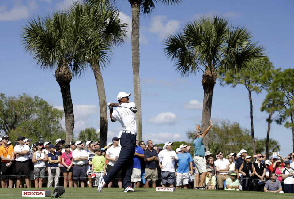 Tiger Woods hits on the 18th tee during the third round of the Honda Classic golf tournament, Saturday, March 1, 2014, in Palm Beach Gardens, Fla. (AP Photo/Lynne Sladky)