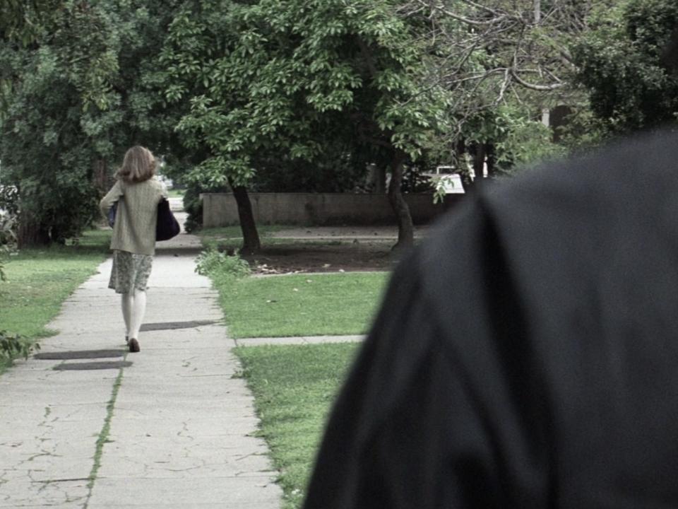 Michael Myers stalking Laurie in Halloween (1978)