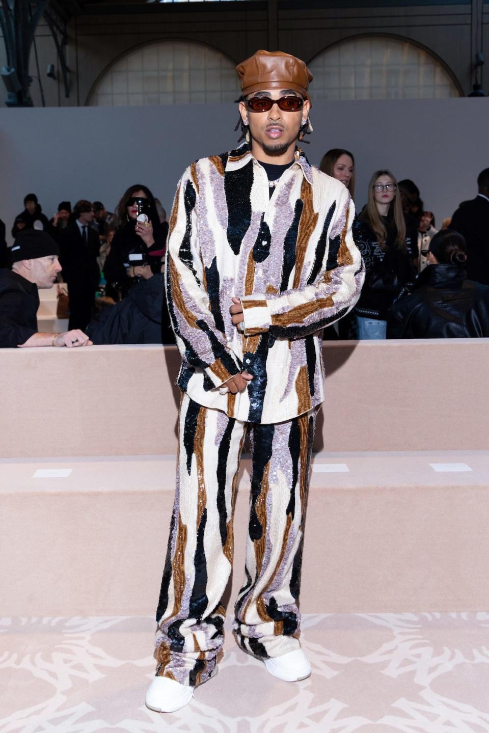 Ozuna attends the Amiri Menswear show at Paris Fashion Week 2024.