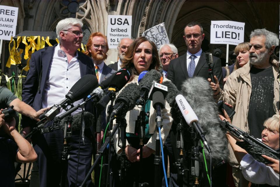 Stella Assange addresses the media outside the High Court on Monday (Reuters)