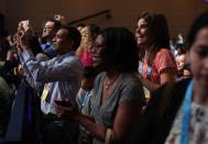 <p>Parents take pictures of their children who are participating onstage in round two of the 2017 Scripps National Spelling Bee at Gaylord National Resort & Convention Center on May 31, 2017. Close to 300 spellers are competing in the annual spelling contest for the top honor this year. (Alex Wong/Getty Images) </p>