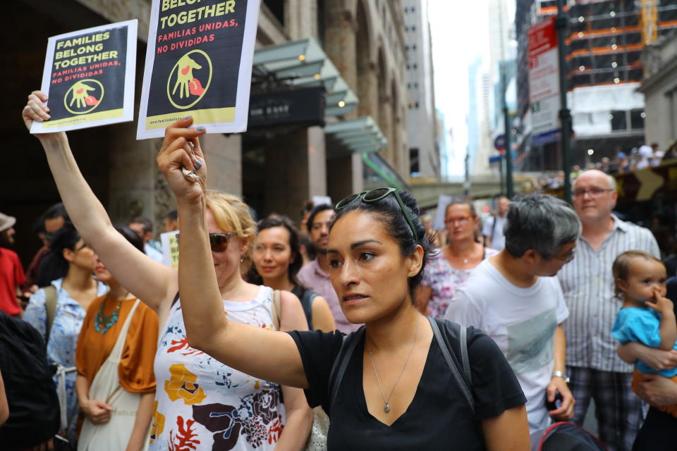 <p>Nicole of Queens carrying a sign in a rally against President Trump’s policy of separating immigrant families on 42nd Street in New York City on June 20, 2018. (Photo: Gordon Donovan/Yahoo News) </p>