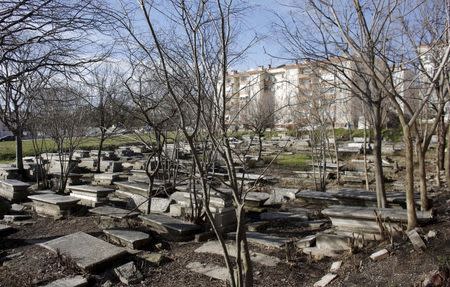 An abandoned Jewish cemetery is pictured in Edirne, western Turkey, February 26, 2015. When the domes of Edirne's abandoned Great Synagogue caved in, Rifat Mitrani, the town's last Jew, knew it spelled the end of nearly two millennia of Jewish heritage in this Turkish town. As a boy, Mitrani studied Hebrew in the synagogue's gardens and, in the 1970s, dispatched its Torah to Istanbul after the community shrank to just three families. In 1975, he unlocked its doors and swept away the cobwebs to marry his wife Sara.Now a five-year, $2.5 million government project has restored the synagogue's lead-clad domes and resplendent interior ahead of its Thursday re-opening, the first temple to open in Turkey in two generations, but one without worshippers. It is part of a relaxation of curbs on religious minorities ushered in during President Tayyip Erdogan's 12 years in power. Yet it coincides with a spike in anti-Semitism in predominantly Muslim Turkey and a wave of Jews moving away, say members of the aging community, which has shrunk by more than a third in the last quarter century. Picture taken February 26, 2015. REUTERS/Murad Sezer