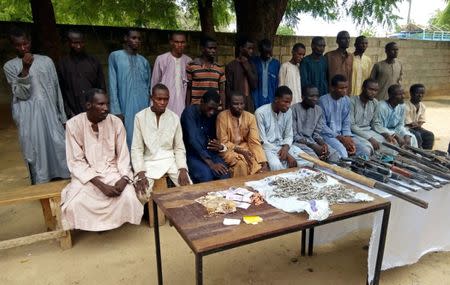 Suspected members of Islamist militant group Boko Haram are pictured after being arrested in Maiduguri, Nigeria July 18, 2018. REUTERS/Ahmed Kingimi