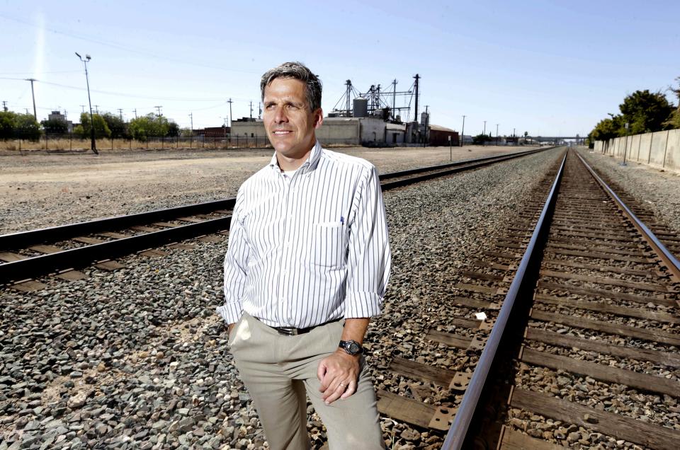 In this photo taken Monday, July 15, 2013, Jeff Morales, chief executive officer of the California High Speed Rail Authority, poses in Fresno, Calif. where construction of the controversial $68 billion bullet train is set to begin. California voters approved a plan to build a high-speed rail system to link Northern and Southern California five years ago. Voters were promised that the rail line would improve access to good-paying jobs, cut pollution and reduce traffic congestion. With work about to begin on the first 30-mile segment in the Central Valley, the region that could see the most benefits is also where opposition has grown most fierce.(AP Photo/Rich Pedroncelli)