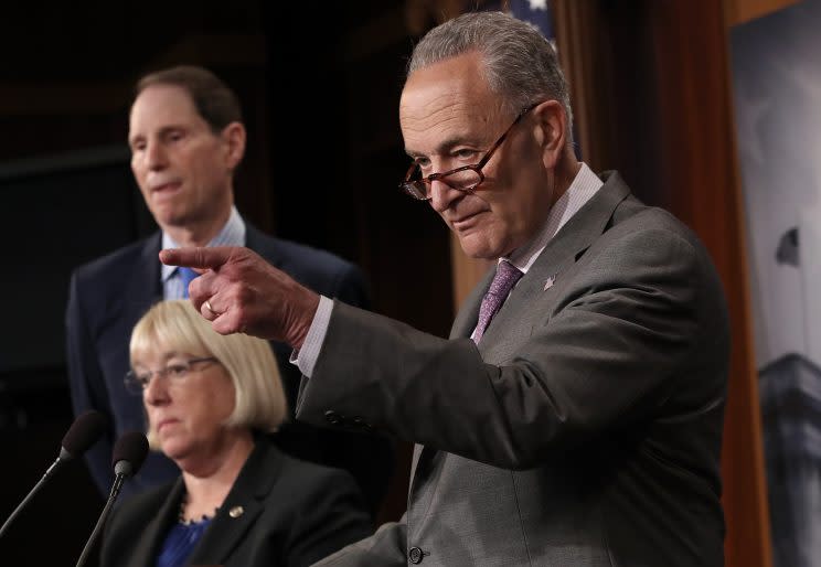 Senate Minority Leader Chuck Schumer, D-N.Y., right, accompanied by Sen. Ron Wyden, D-Ore., and Sen. Patty Murray, D-Wash., answers questions during a press conference at the Capitol on July 13, 2017, in Washington, D.C. (Photo: Win McNamee/Getty Images)