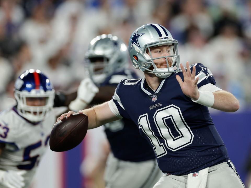 Cooper Rush looks to throw against the New York Giants.
