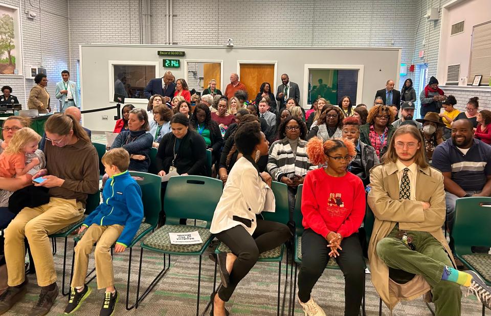 Members of the public file into SCCPSS's Eli Whitney Administrative Complex, filing nearly every available seat ahead of the Dec. 6, 2023 Regular Meeting of the school board ahead of the anticipated Long-Range Facilities plan vote.