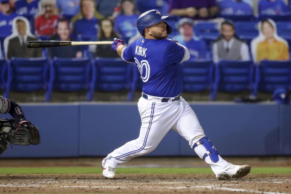 Toronto Blue Jays' Alejandro Kirk follows through on a two-run home run against the Atlanta Braves during the fifth inning of a baseball game Friday, April 30, 2021, in Dunedin, Fla. (AP Photo/Mike Carlson)