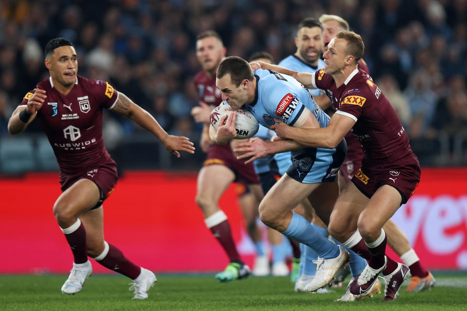 Seen here, NSW forward Isaah Yeo being tackled during game one of the 2022 State of Origin series in Sydney.