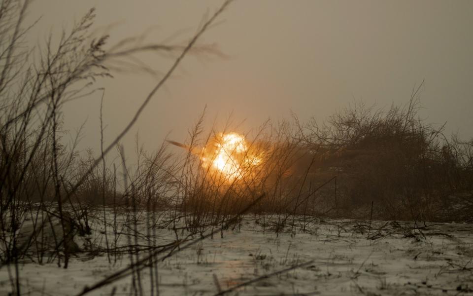 The 122mm gun fires on Russian positions in the occupied eastern Ukrainian city