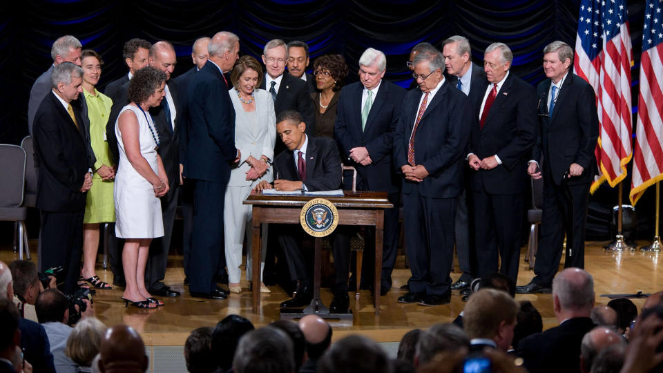 President Barack Obama delivers remarks and signs the Dodd-Frank Wall Street Reform and Consumer Protection Act at the Ronald Reagan Building in Washington, July 21, 2010.