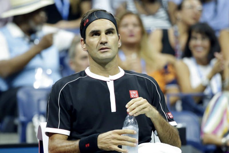 Roger Federer of Switzerland sits on the bench during a change over in his quarterfinal match against Grigor Dimitrov of Bulgaria in Arthur Ashe Stadium at the 2019 U.S. Open Tennis Championships at the USTA Billie Jean King National Tennis Center on September 3, 2019 in New York City. The tennis player turns 42 on August 8. File Photo by John Angelillo/UPI