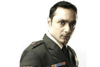 <b>6. Rahul Bose/Shaurya</b><br><br>When Rahul Bose is not getting under the skin of various eccentric characters for various movies, he comes forth and shows us what a dapper dude he can be. His sharp and serious look in 'Shaurya' was a winner all the way.