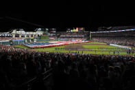 Players line up before Game 1 in baseball's World Series between the Houston Astros and the Atlanta Braves Tuesday, Oct. 26, 2021, in Houston. (AP Photo/Eric Gay)