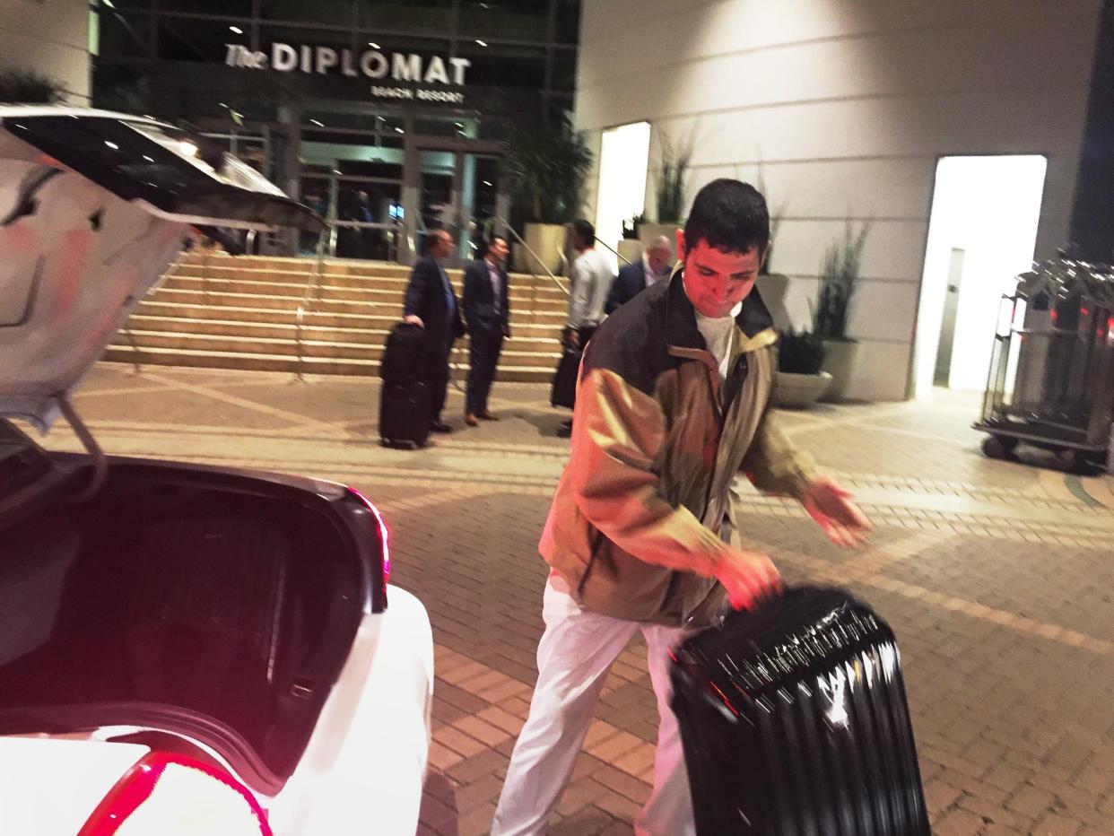 Julio Lopez handles a suitcase at the Diplomat Beach Resort in Hollywood, Florida, before COVID-19 forced it to close. The 16-year hotel veteran and his co-workers are demanding that they get their jobs back once the hotel reopens. (Photo: Courtesy Julio Lopez)