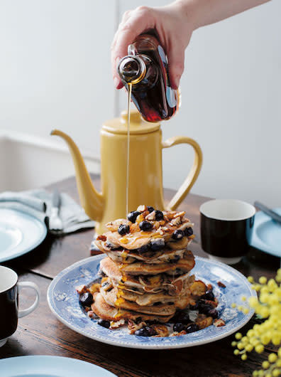 <p>Look no further than veggie chef <a rel="nofollow noopener" href="https://deliciouslyella.com/2015/06/27/guest-recipe-banana-blueberry-and-pecan-pancakes/" target="_blank" data-ylk="slk:Anna Jones;elm:context_link;itc:0;sec:content-canvas" class="link ">Anna Jones</a> for the perfect pancakes this year. We have our eyes (and bellies) on her banana, blueberry and pecan stack. <br><br><b>Ingredients:</b><br> <br> 100g oats<br>A handful of pecan nuts (about 50g), roughly chopped<br>1 teaspoon baking powder<br>A pinch of sea salt<br>1 ripe banana, peeled and mashed<br>150ml coconut milk or almond milk<br>A 200g punnet of blueberries<br>To serve: 2 bananas, peeled and cut into thin slices, coconut oil, crumbled pecan nuts, lime wedges, honey, maple syrup or agave syrup <em>[Photo: Anna Jones]</em> </p>