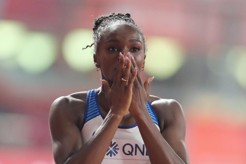 Britain's Dina Asher-Smith reacts after winning the Women's 200m final at the 2019 IAAF Athletics World Championships at the Khalifa International stadium in Doha on October 2, 2019. (Photo by KARIM JAAFAR / AFP) (Photo by KARIM JAAFAR/AFP via Getty Images)