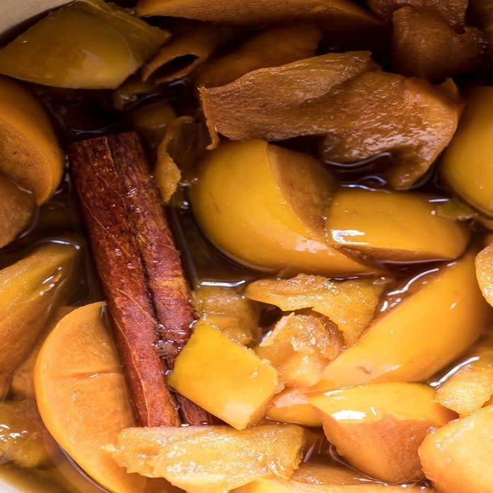 Persimmons soaking in Bourbon