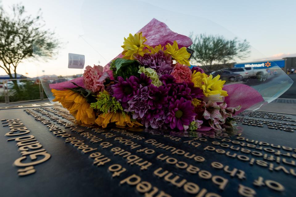 Flowers are left by the Grand Candela Memorial at the Walmart in El Paso after Patrick Crusius, the white supremacist who killed 23 people inside the Walmart on Aug. 3, 2019, was sentenced to 90 consecutive life sentences on Friday, July 7, 2023.