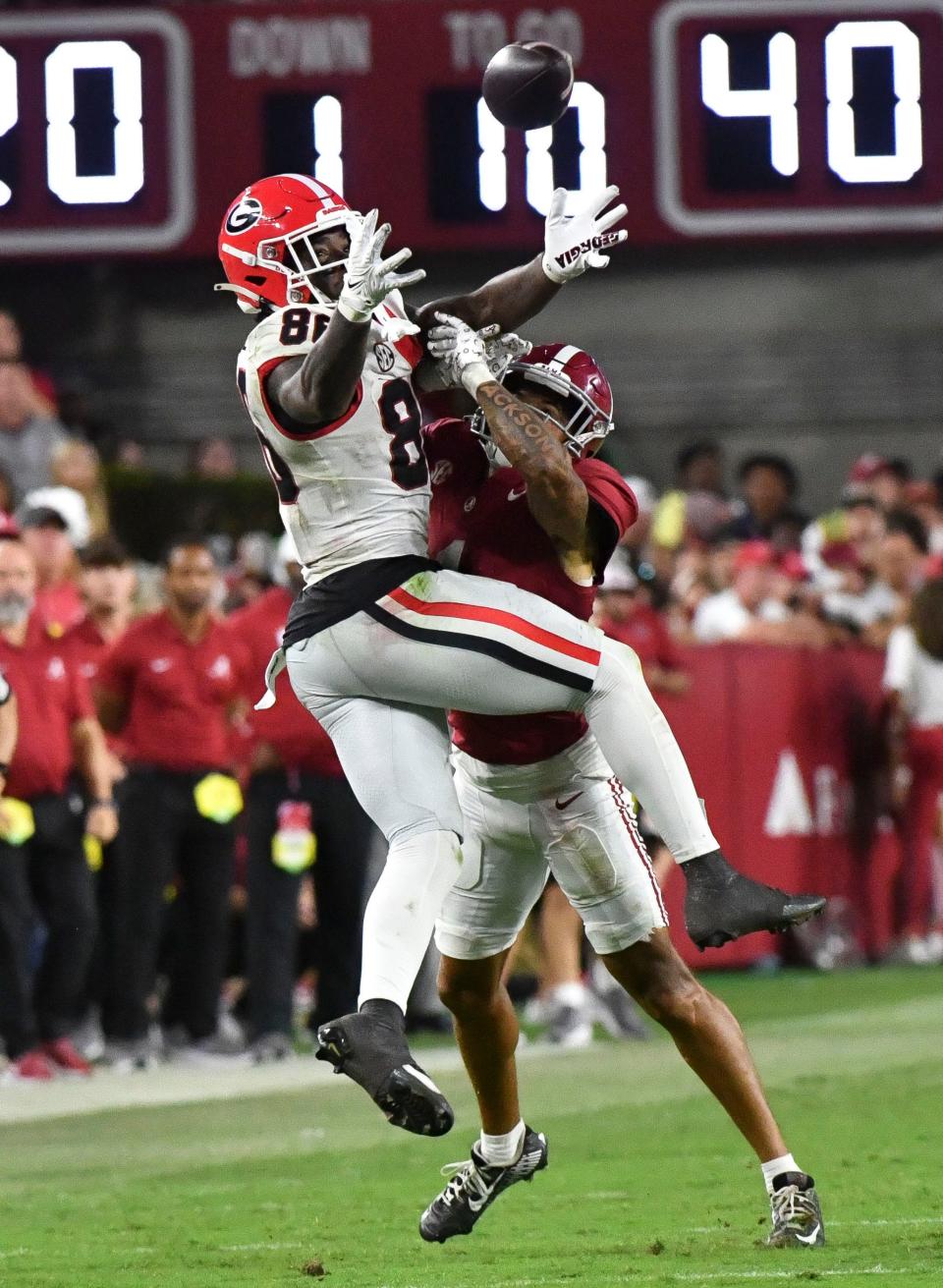 Sep 28, 2024; Tuscaloosa, Alabama, USA; Alabama Crimson Tide defensive back Domani Jackson (1) defends a pass to Georgia Bulldogs wide receiver Dillon Bell (86) at Bryant-Denny Stadium. Alabama defeated Georgia 41-34. Mandatory Credit: Gary Cosby Jr.-Imagn Images