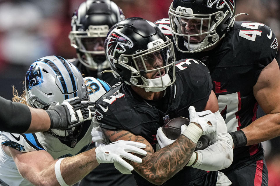 Atlanta Falcons safety Jessie Bates III (3) runs after recovering a fumble against the Carolina Panthers during the first half of an NFL football game, Sunday, Sept. 10, 2023, in Atlanta. (AP Photo/Brynn Anderson)