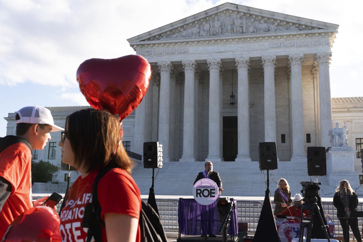 Anti-abortion activists rally outside the Supreme Court, Monday, Nov. 1, 2021, as arguments are set to begin about abortion by the court, on Capitol Hill in Washington. (AP Photo/Jacquelyn Martin)