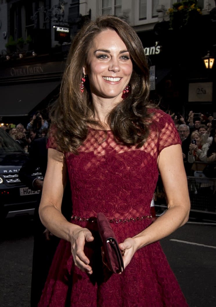 <i>The Duchess accessorised with a pair of statement earrings [Photo: PA]</i>