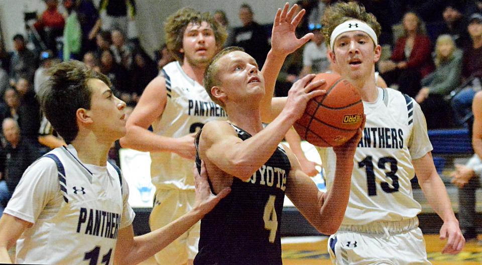 Waverly-South Shore's Owen Gilmour looks to score against Great Plains Lutheran defenders Hayden Karli (11) and Alex Heil during a high school boys-girls basketball doubleheader on Thursday, Feb. 16, 2023 in Watertown.