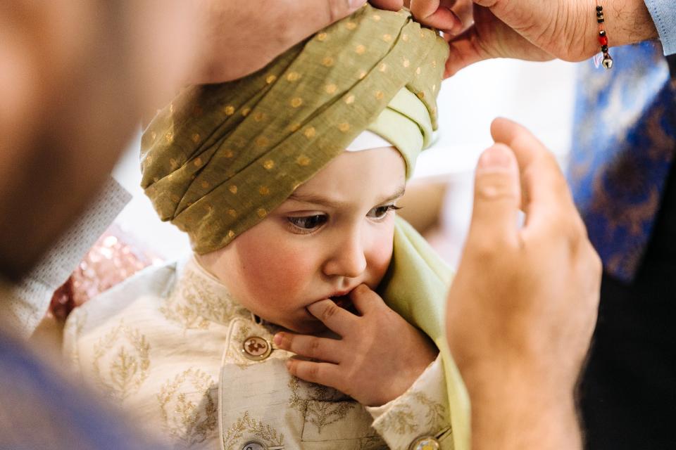 Charlie’s nephew Henry has his turban tied. He wore a custom outfit from Anita Dongre that coordinated with Charlie’s. He looked unbelievably cute.