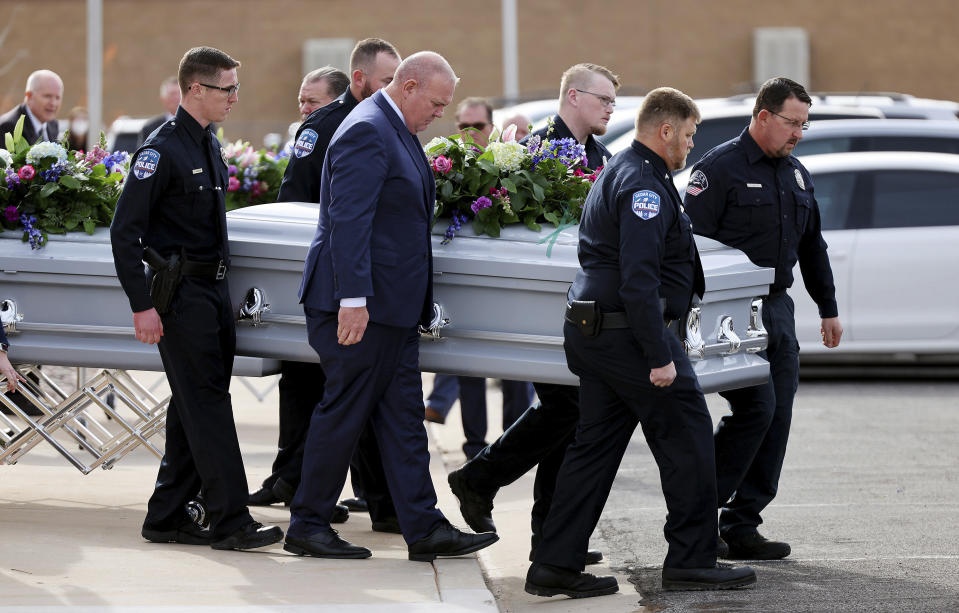 The caskets are brought out following funeral services of the Haight and Earl families in La Verkin, Utah, on Friday, Jan. 13, 2023, in La Verkin, Utah. Tausha Haight, her mother, Gail Earl, and her five children were shot and killed by her husband Jan. 4. (Scott G Winterton/The Deseret News via AP)