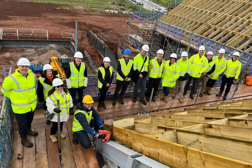 The topping out ceremony at Tithebarn Green Local Centre