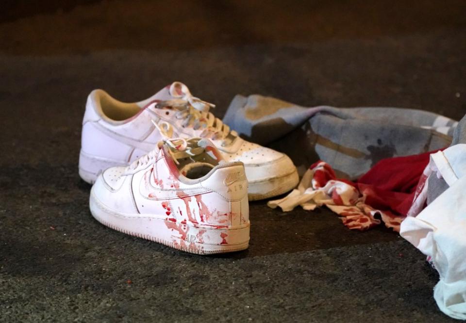 The bloody sneakers worn by a man shot in the chest in East Harlem early Saturday. Christopher Sadowski